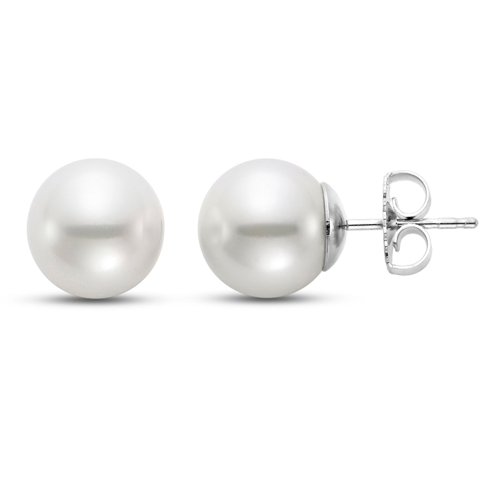 Two pearl earrings. One on the side and the other on its front. With white gold.