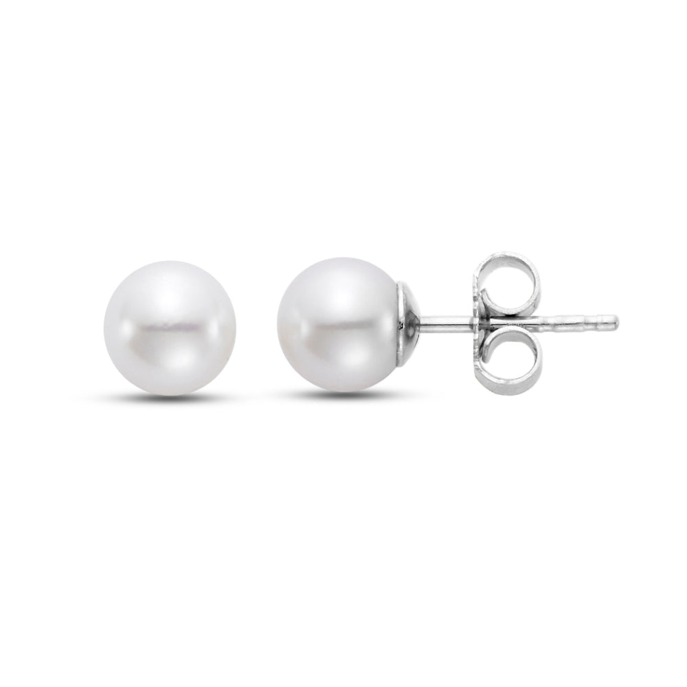 Two pearl earrings, on the front and the other on the side with with gold