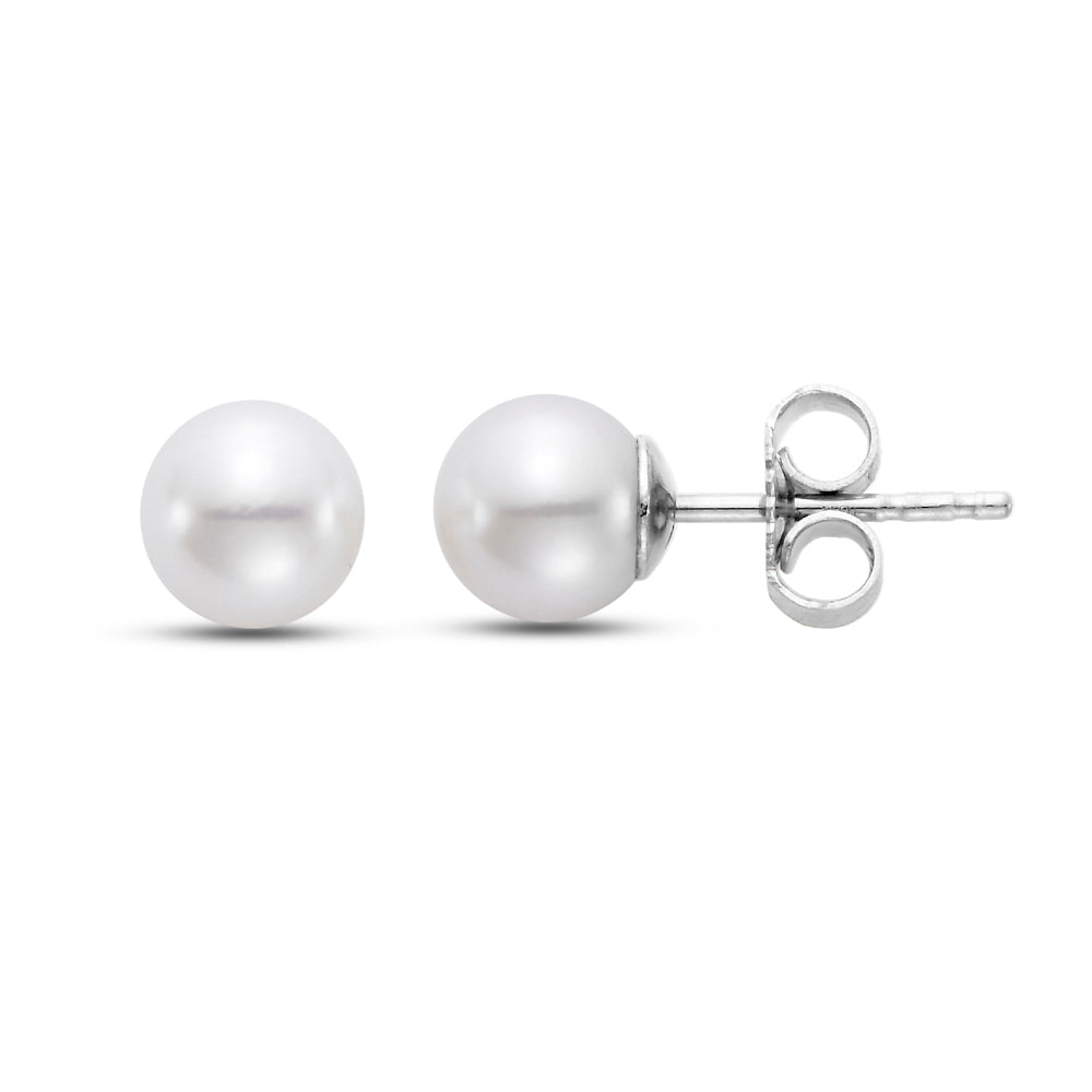 Two pearl earring. One front sided and the other on its side with white gold.