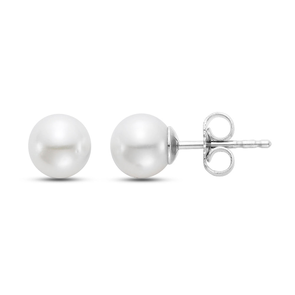 One front sided pearl earring and one on the side, white gold.
