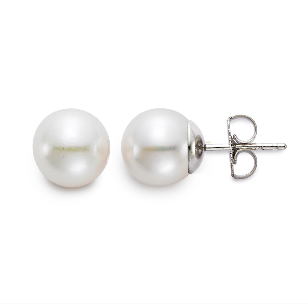Two pearl earrings on front wise and the other on its side.