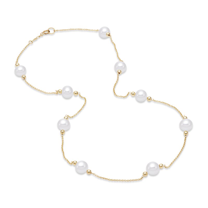 Gold necklace with pearls scattered around the gold chain