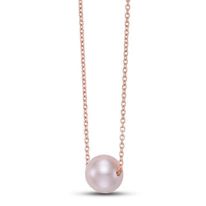 Pearl necklace with rose gold chain on a white background