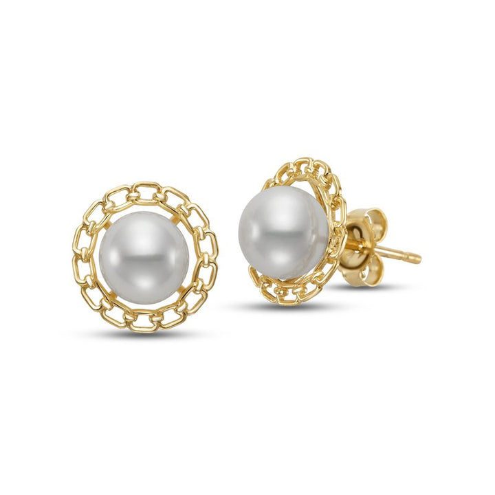A pair of gold stud earrings each featuring a central white pearl encircled by an openwork gold chain-link design. One earring is displayed facing forward, while the other is angled to show the post and butterfly backing.