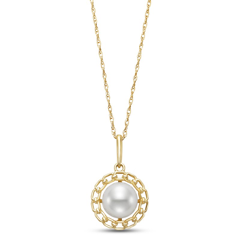 A gold necklace featuring a circular pendant with a central white pearl encased in a decorative gold chain-link border. The chain is a fine, twisted gold link design.