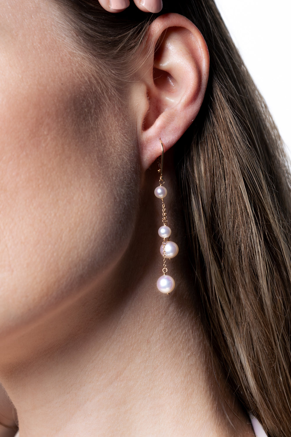 woman wearing 4-8mm-freshwater-pearl-earrings-in-14k-gold