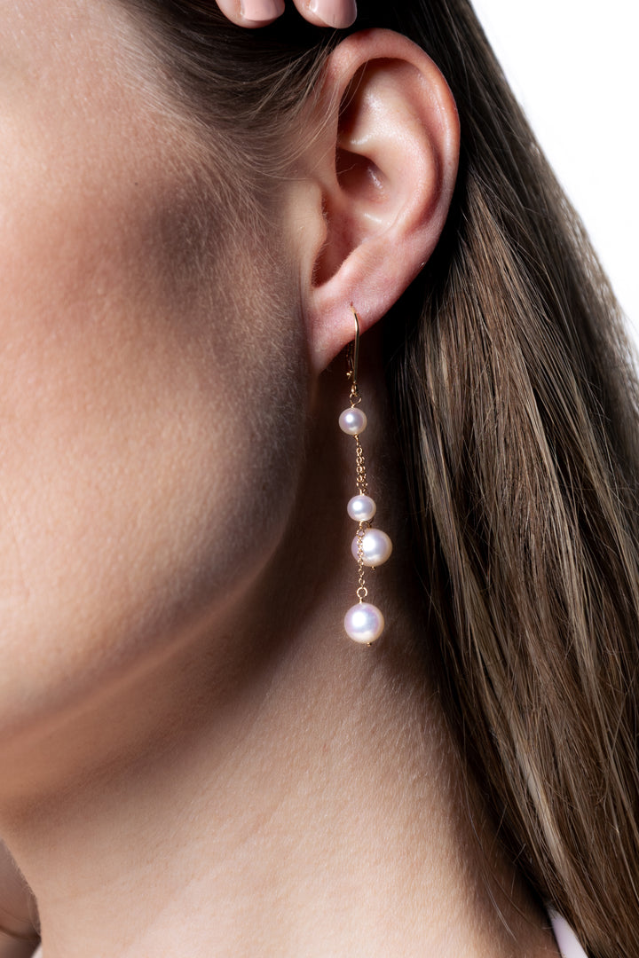 woman wearing 4-8mm-freshwater-pearl-earrings-in-14k-gold