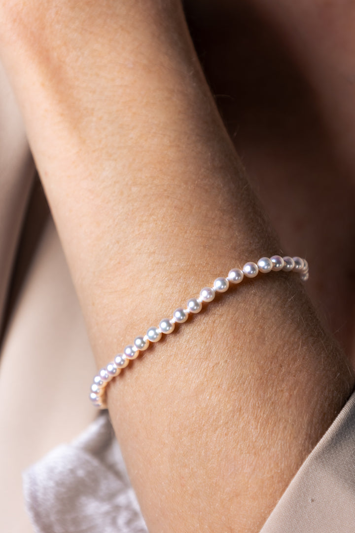 woman wearing 3.5-4mm Freshwater Pearl Bracelet