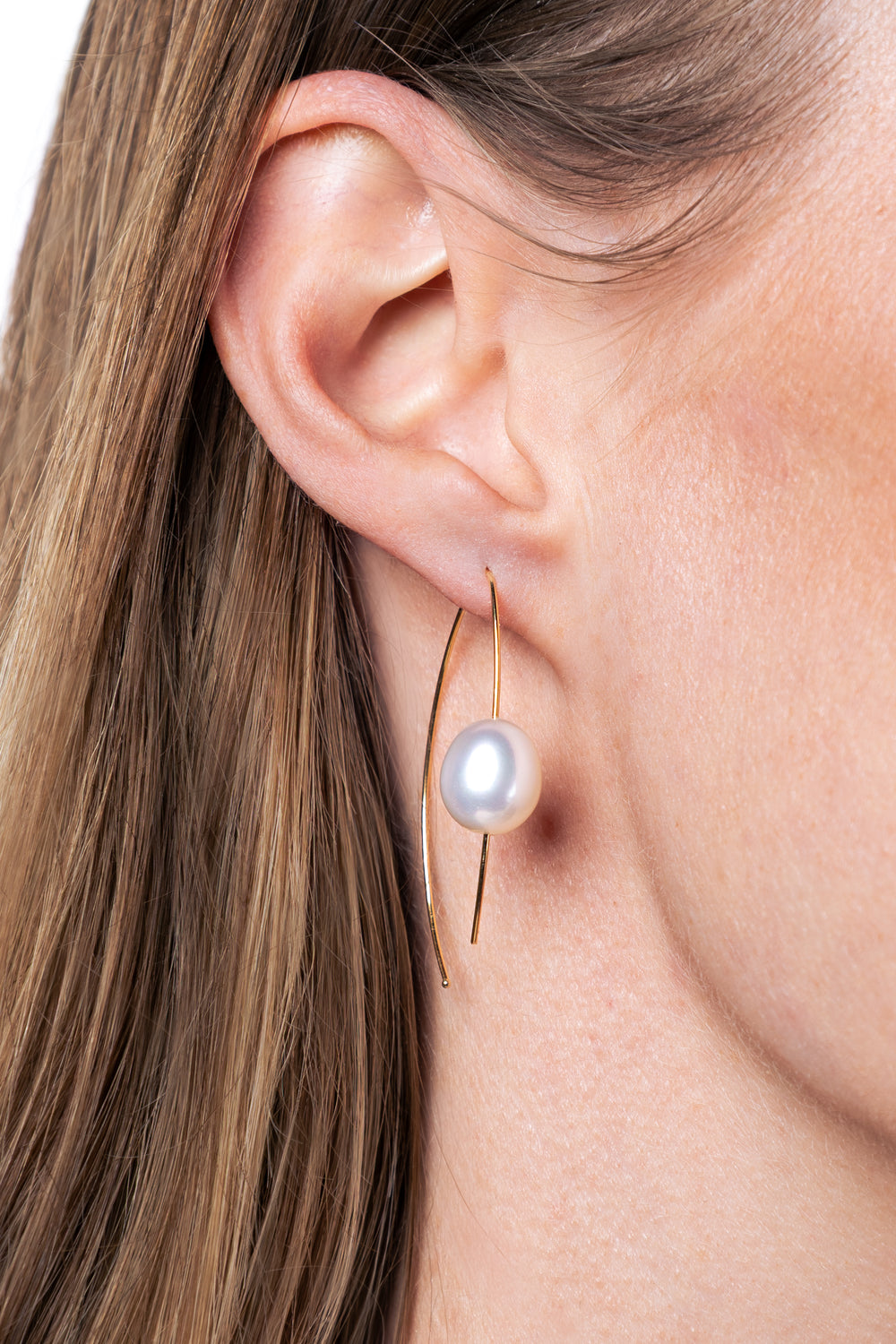 woman wearing 9.5-10mm Freshwater Pearl Earrings in 14K Yellow Gold