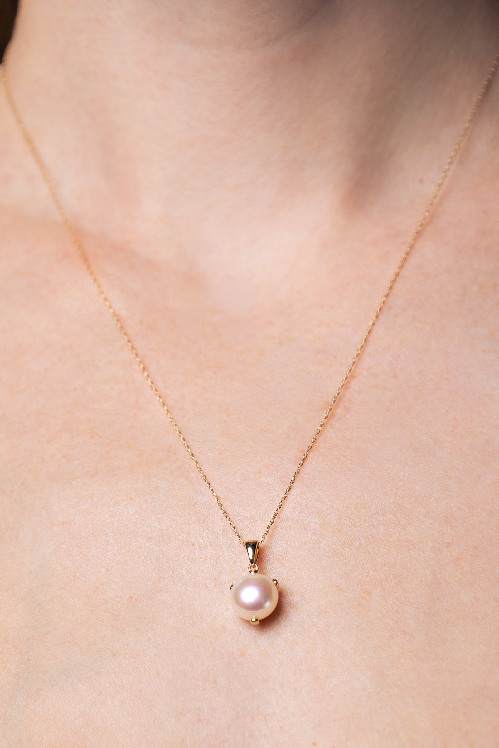 woman wearing 9-9.5mm Freshwater Pearl Pendant in 14K Gold