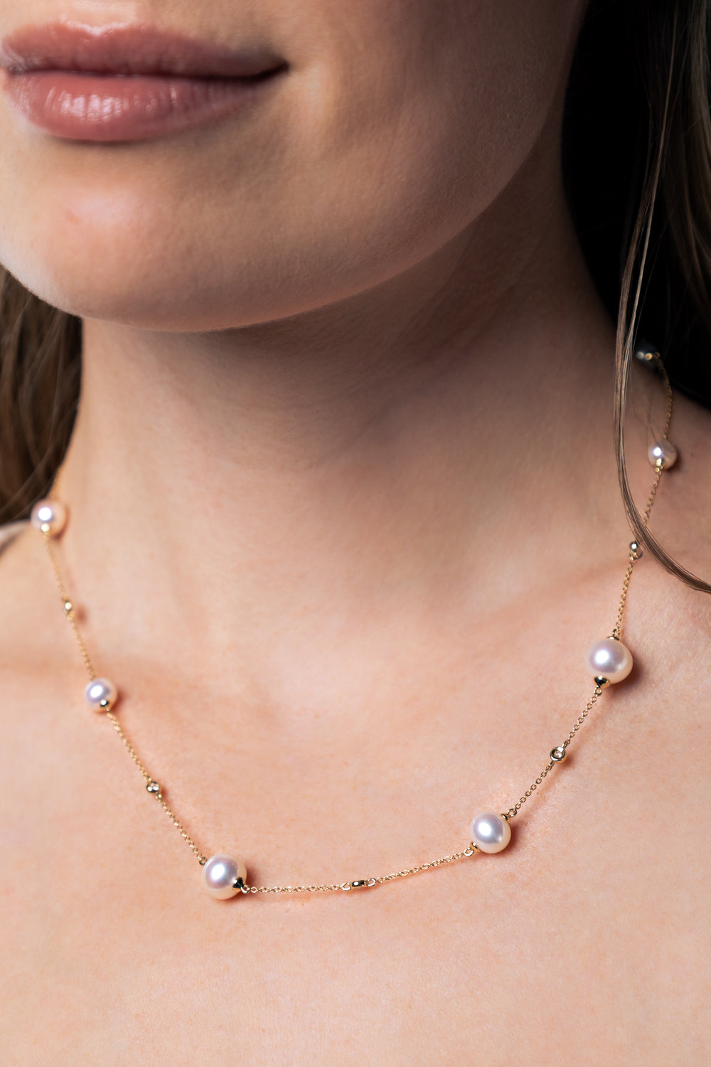 woman wearing 5 to 9.5mm Freshwater Pearl Diamond Necklace