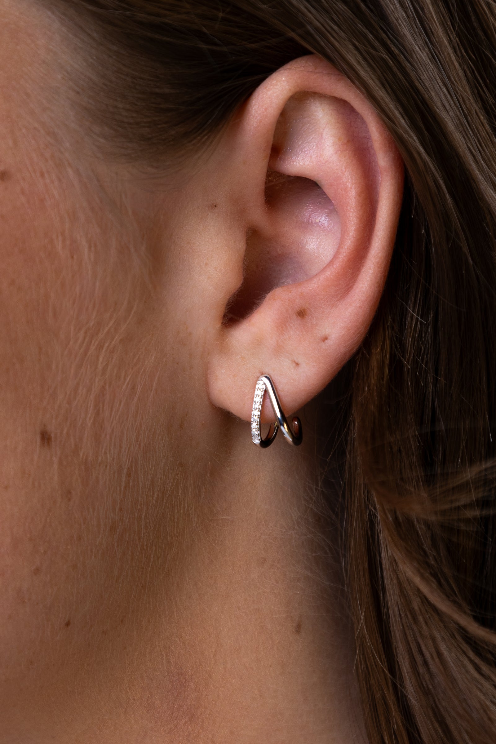 women wearing Silver Split Hoop Lab-Created Diamond Huggie Earrings