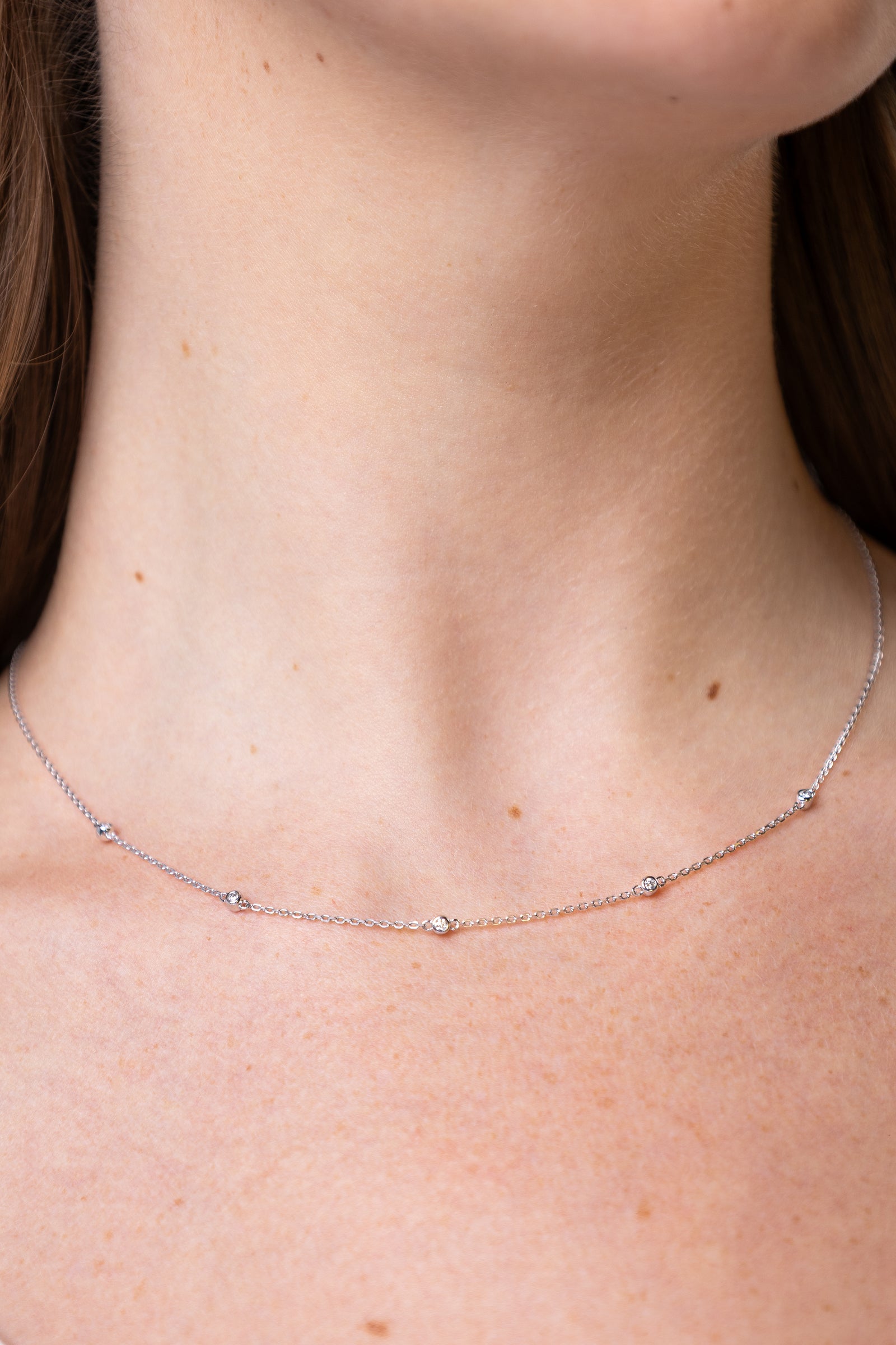 women wearing Silver Bezel-Set Lab-Created Diamond Station Necklace