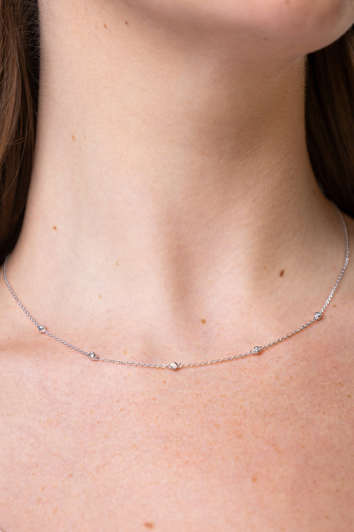 women wearing Silver Bezel-Set Lab-Created Diamond Station Necklace