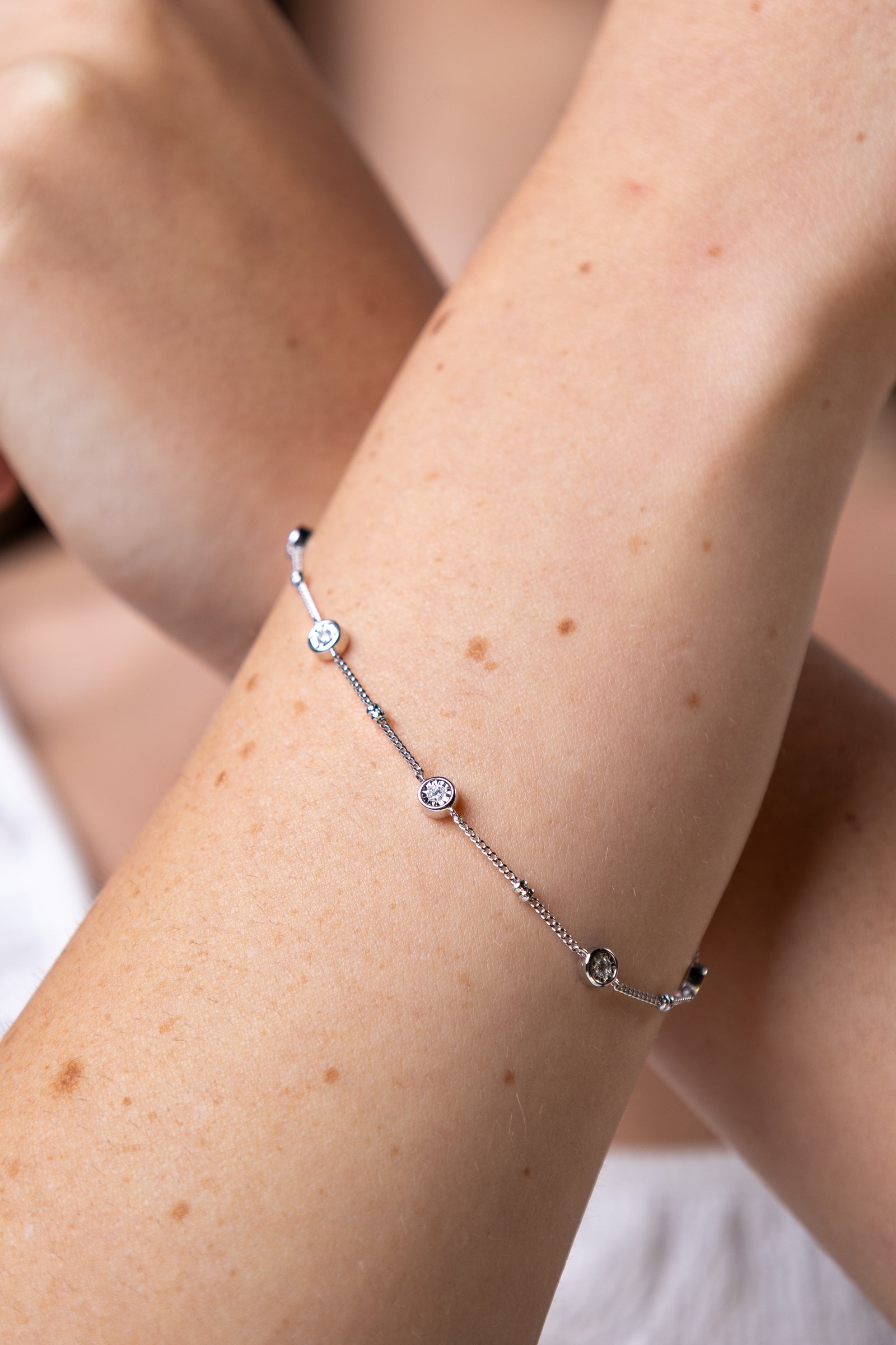 women wearing Silver Bezel Station Lab-Created Diamond Beaded Bolo Bracelet