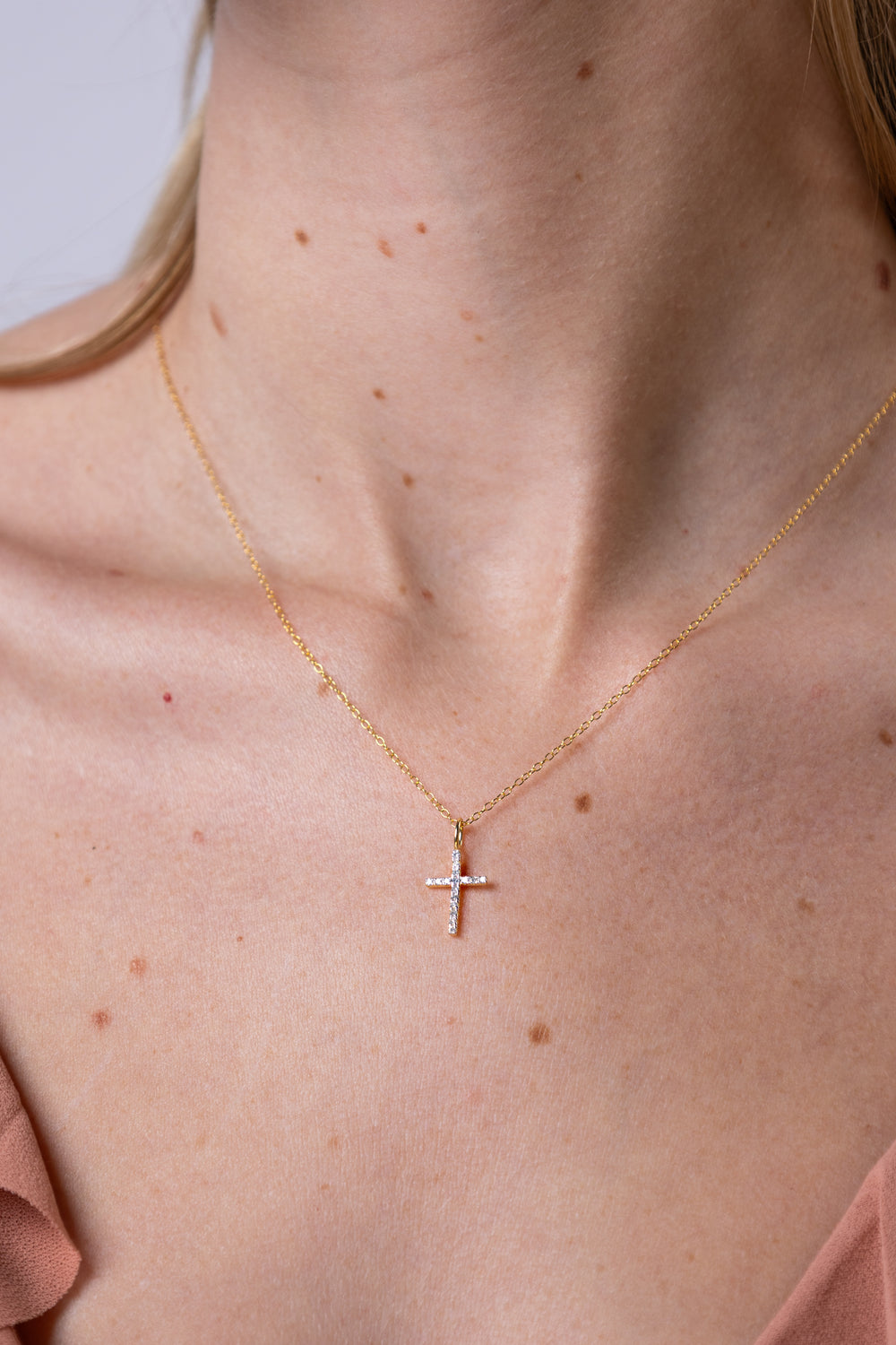 women wearing Gold Cross Pendant Necklace
