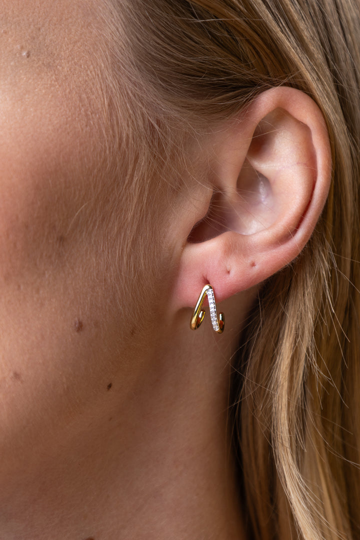 woman wearing Gold Split Hoop Lab-Created Diamond Huggie Earrings