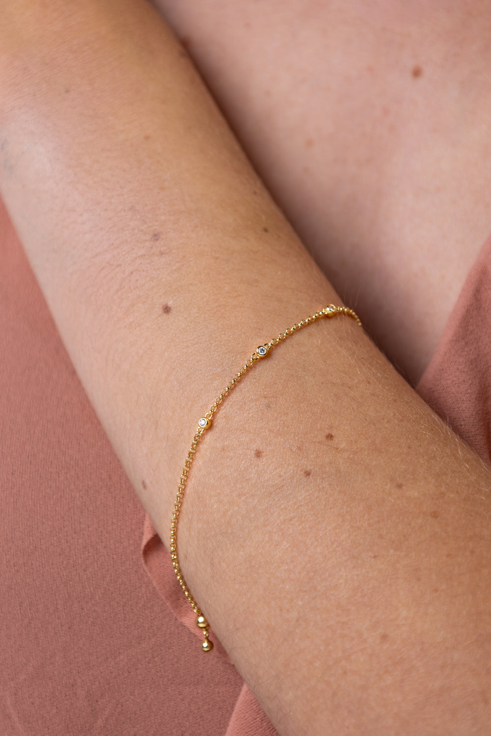 women wearing Gold Bezel Station Bolo Bracelet