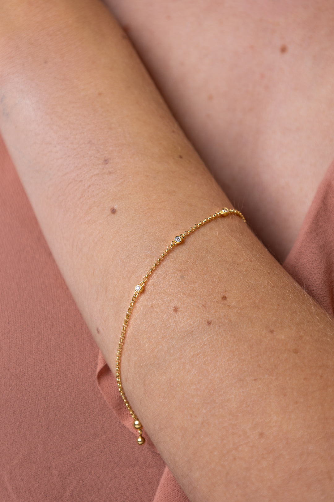 women wearing Gold Bezel Station Bolo Bracelet