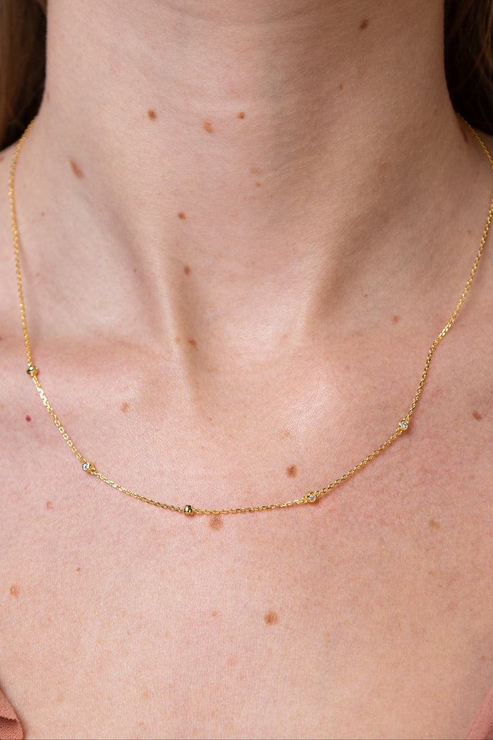 women wearing Gold Bezel-Set Lab-Created Diamond Station Necklace