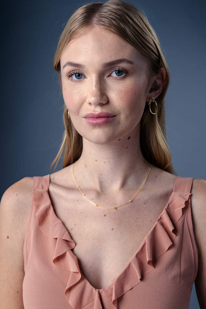 women wearing Gold Bezel-Set Lab-Created Diamond Station Necklace