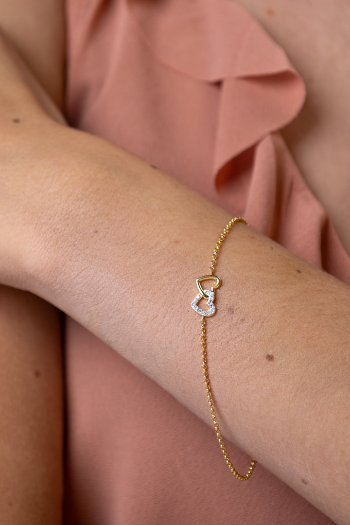 women wearing diamond-yellow-double-hearts-bracelet