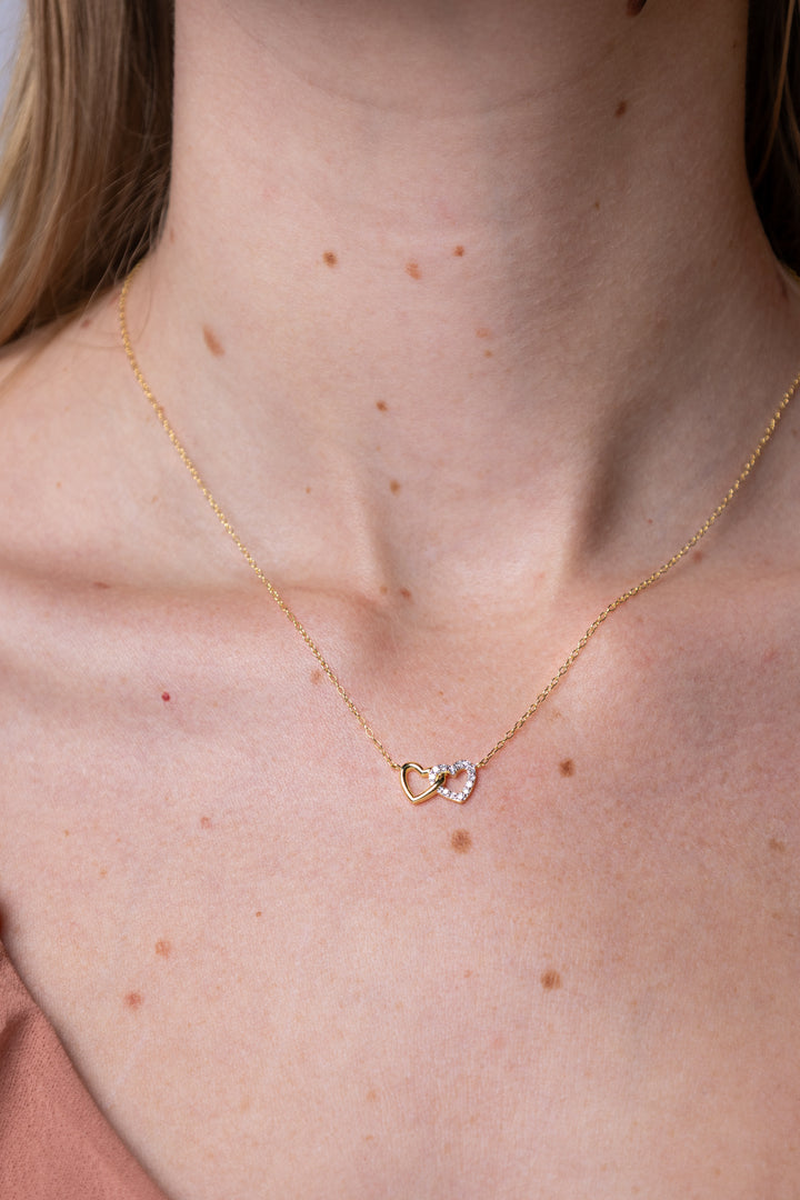 women wearing diamond-double-hearts-yellow-necklace