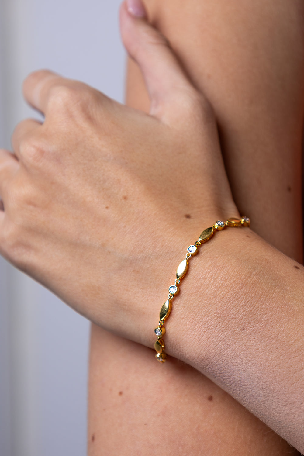 women wearing diamond-yellow-leaves-bracelet