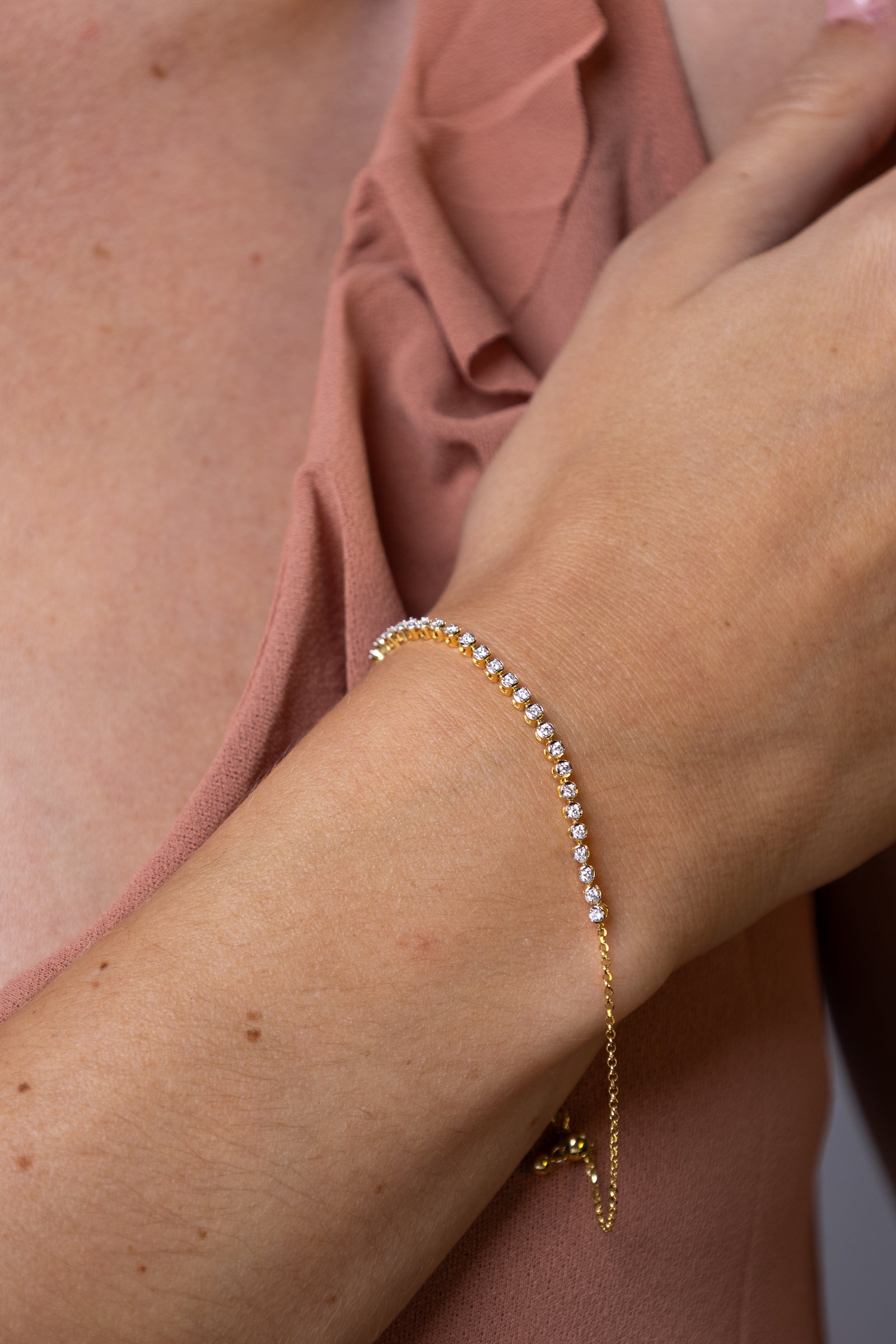 women wearing diamond-row-yellow-bracelet