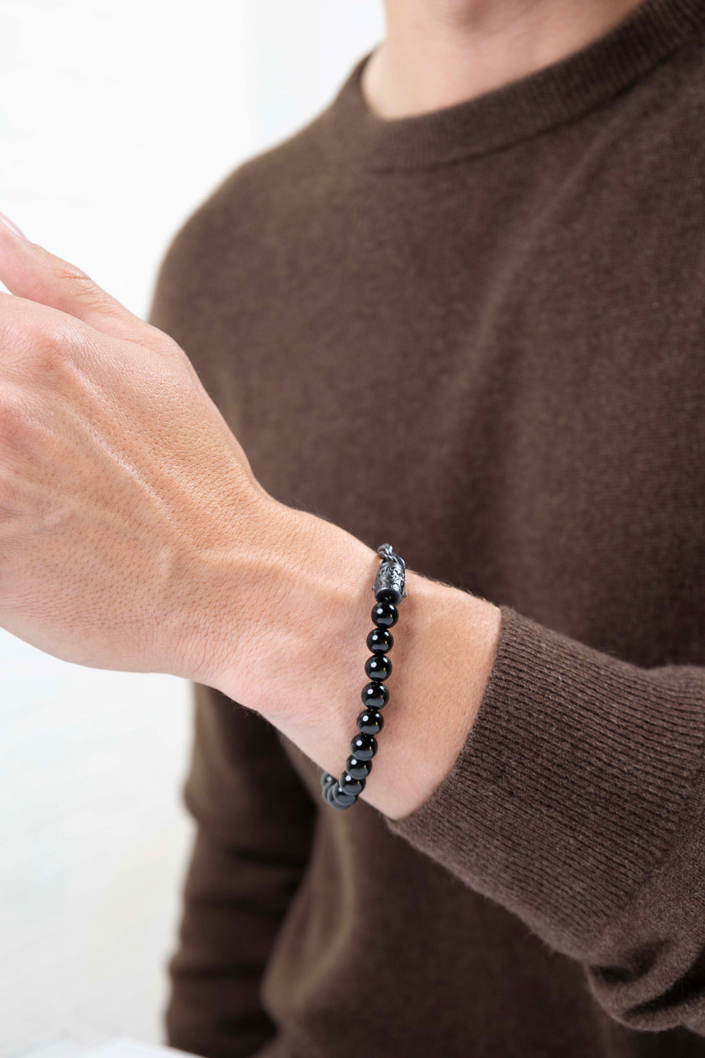 man wearing Dark Reign Chisel Rondelle Cuban Chain Black Agate Beaded Bracelet