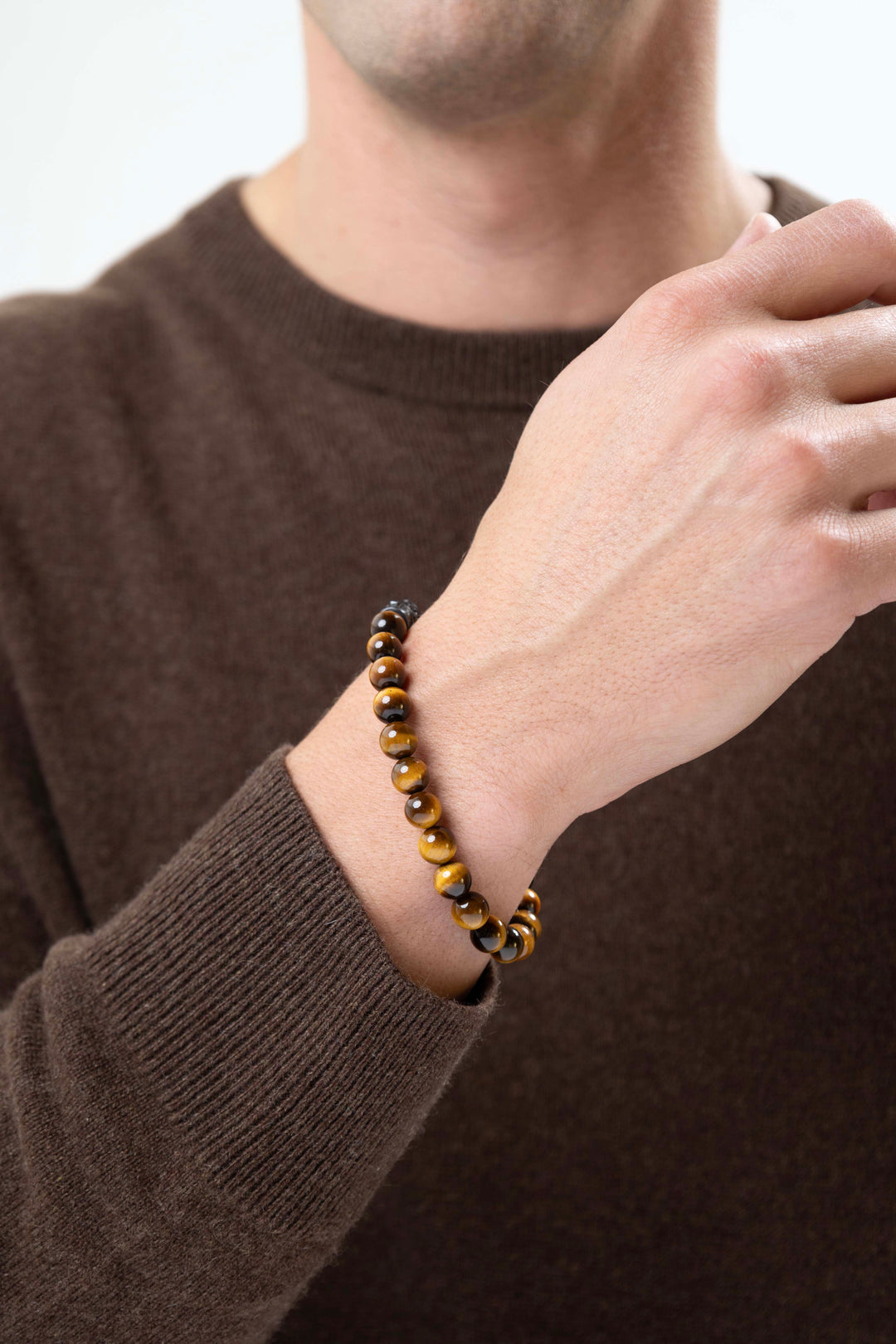 Man wearing Dark Reign Chisel Rondelle Cuban Chain Tiger's Eye Beaded Bracelet
