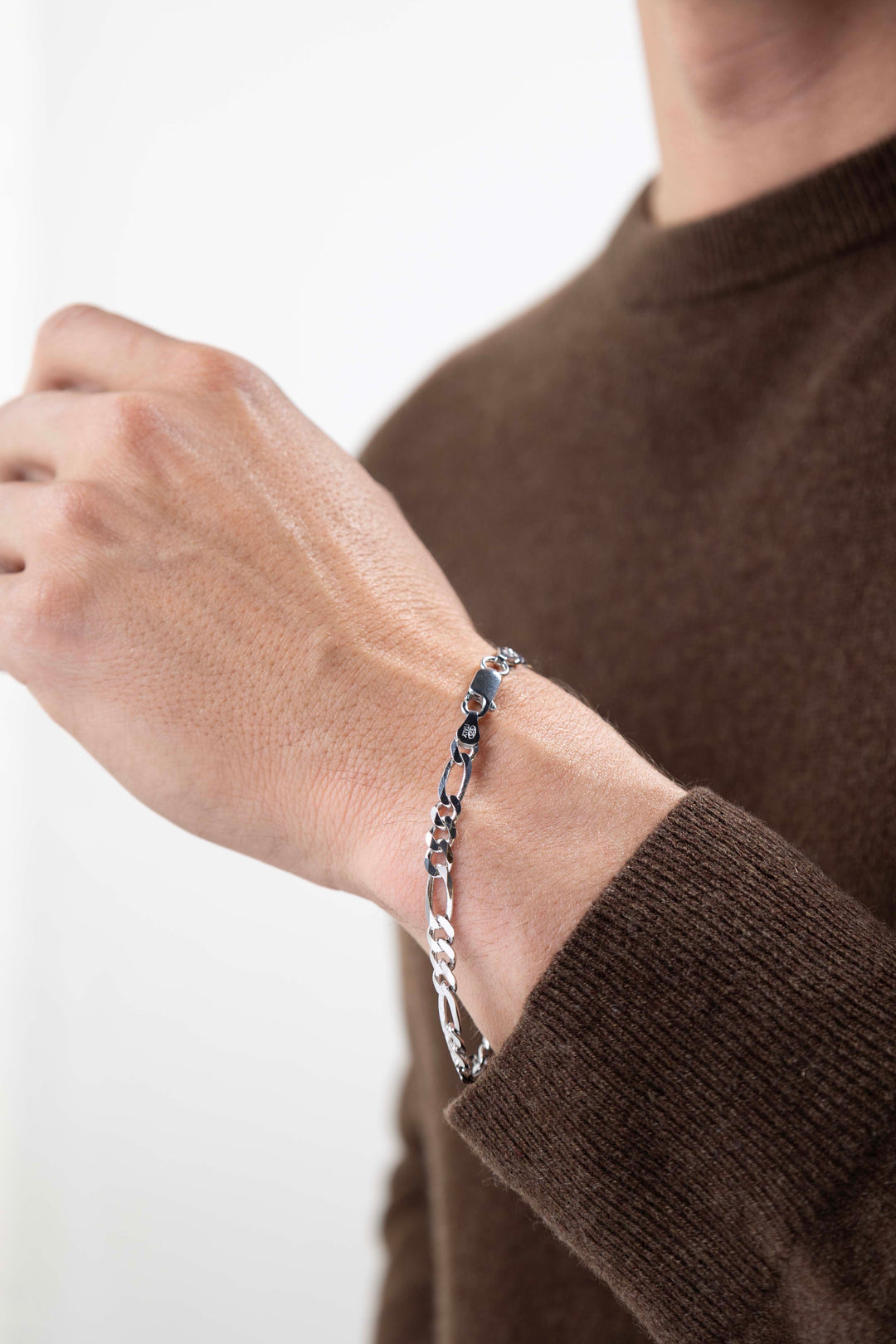 man wearing Italian Chain Rhodium Plated Figaro 3+1 Bracelet - 8.5"