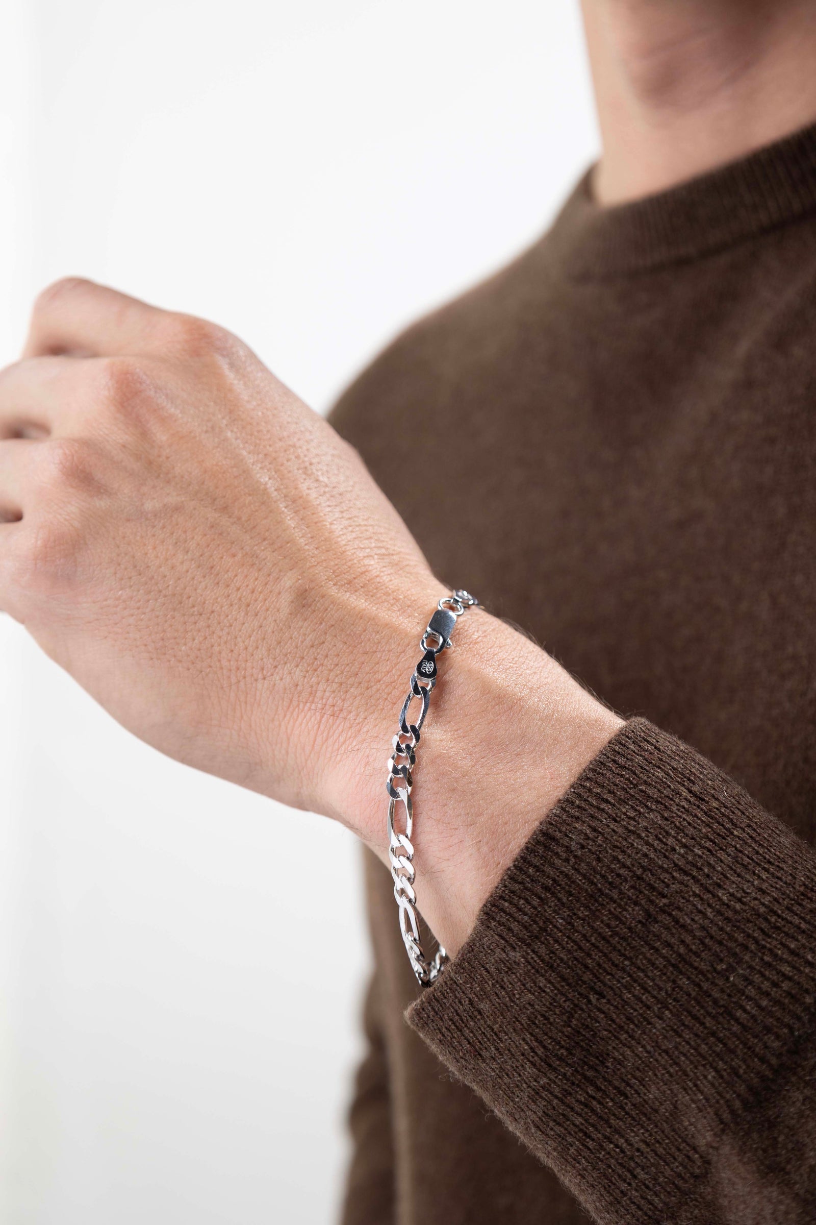 man wearing Italian Chain Rhodium Plated Figaro 3+1 Bracelet - 8.5"