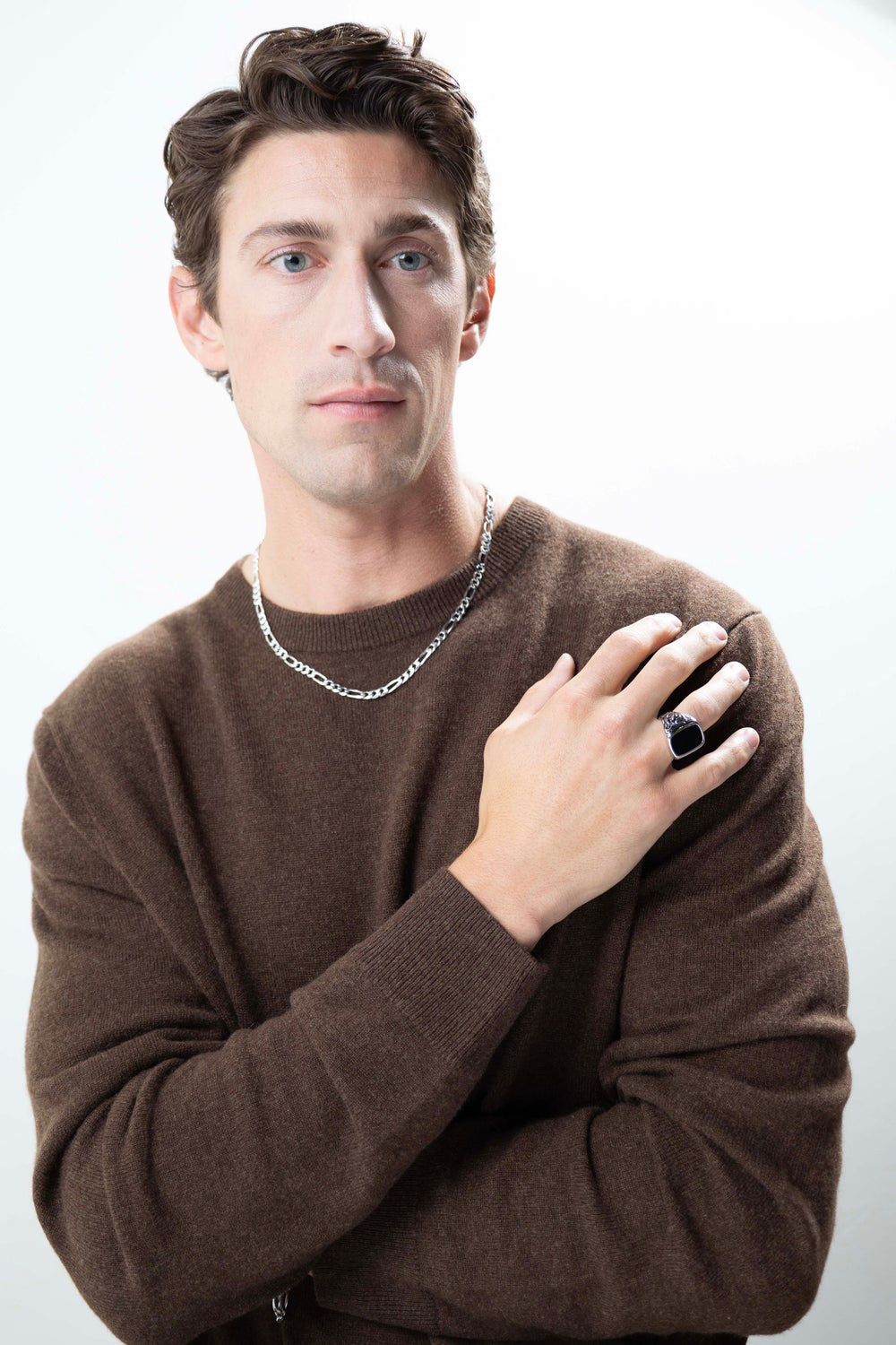 man wearing Italian Chain Rhodium Plated Figaro 3+1 Necklace - 20" with black ring