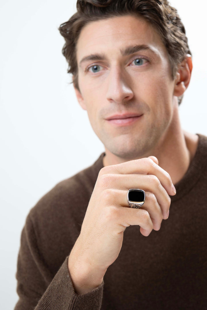 Man wearing Chisel Rhodium Plated Black Agate Cushion Ring